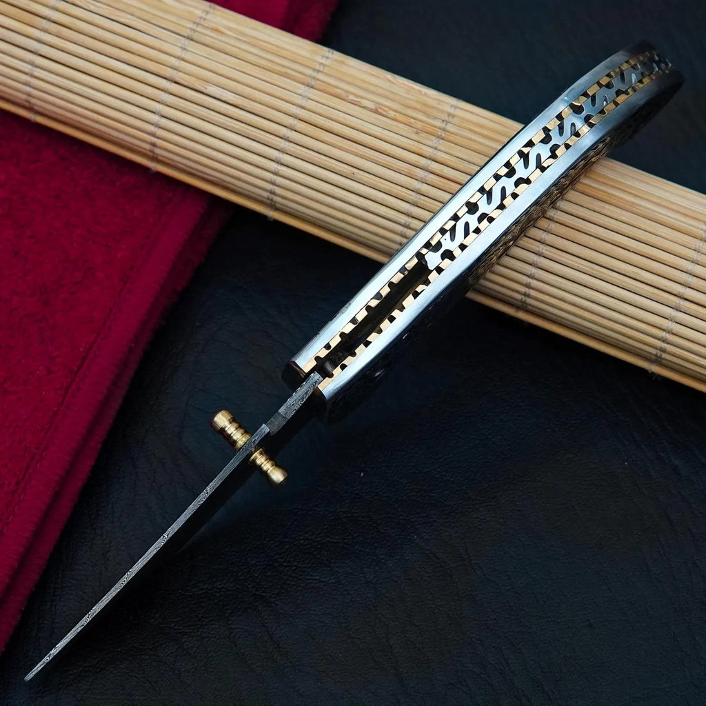 Nordic Forge Hand Engraved Damascus Folding Knife