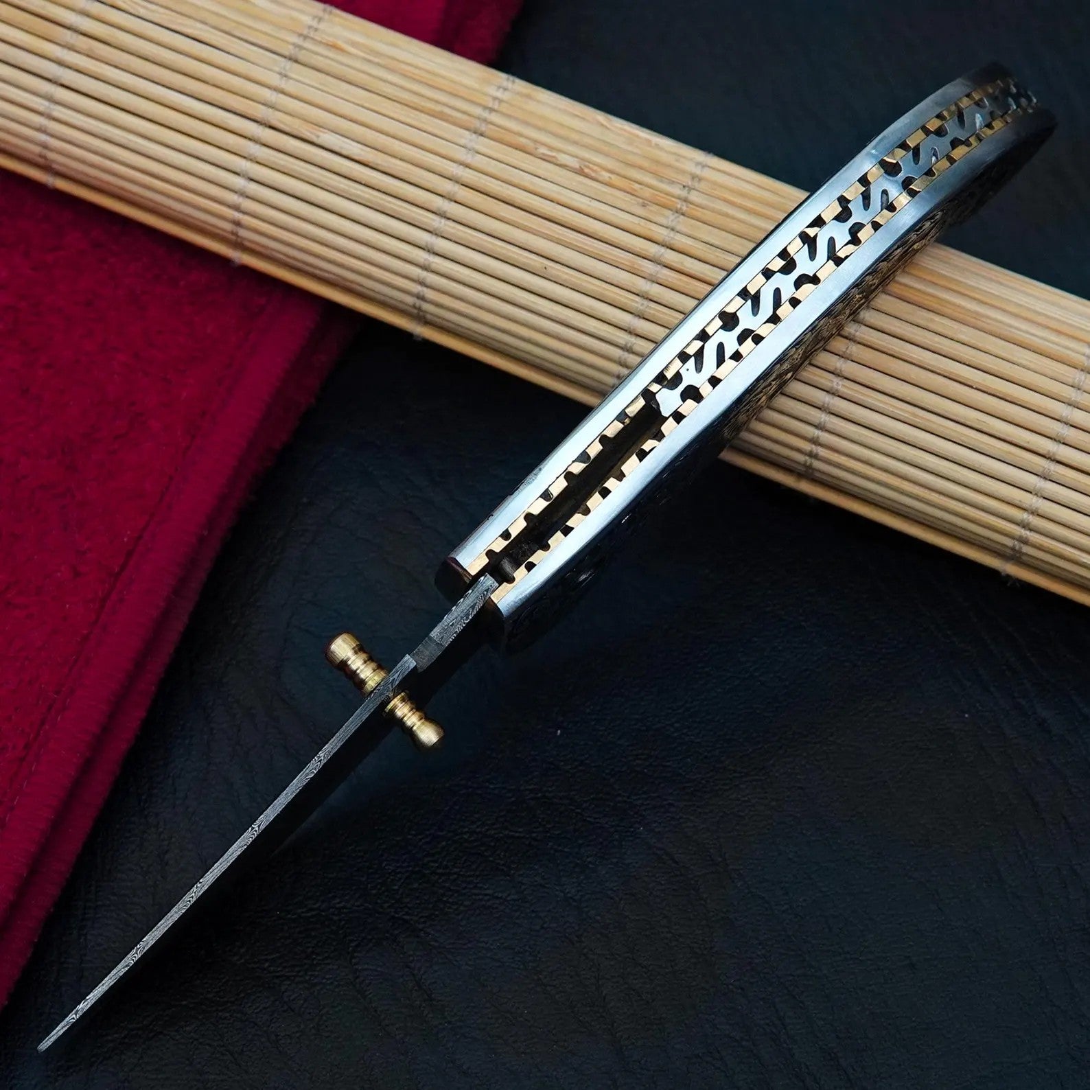 Nordic Forge Hand Engraved Damascus Folding Knife