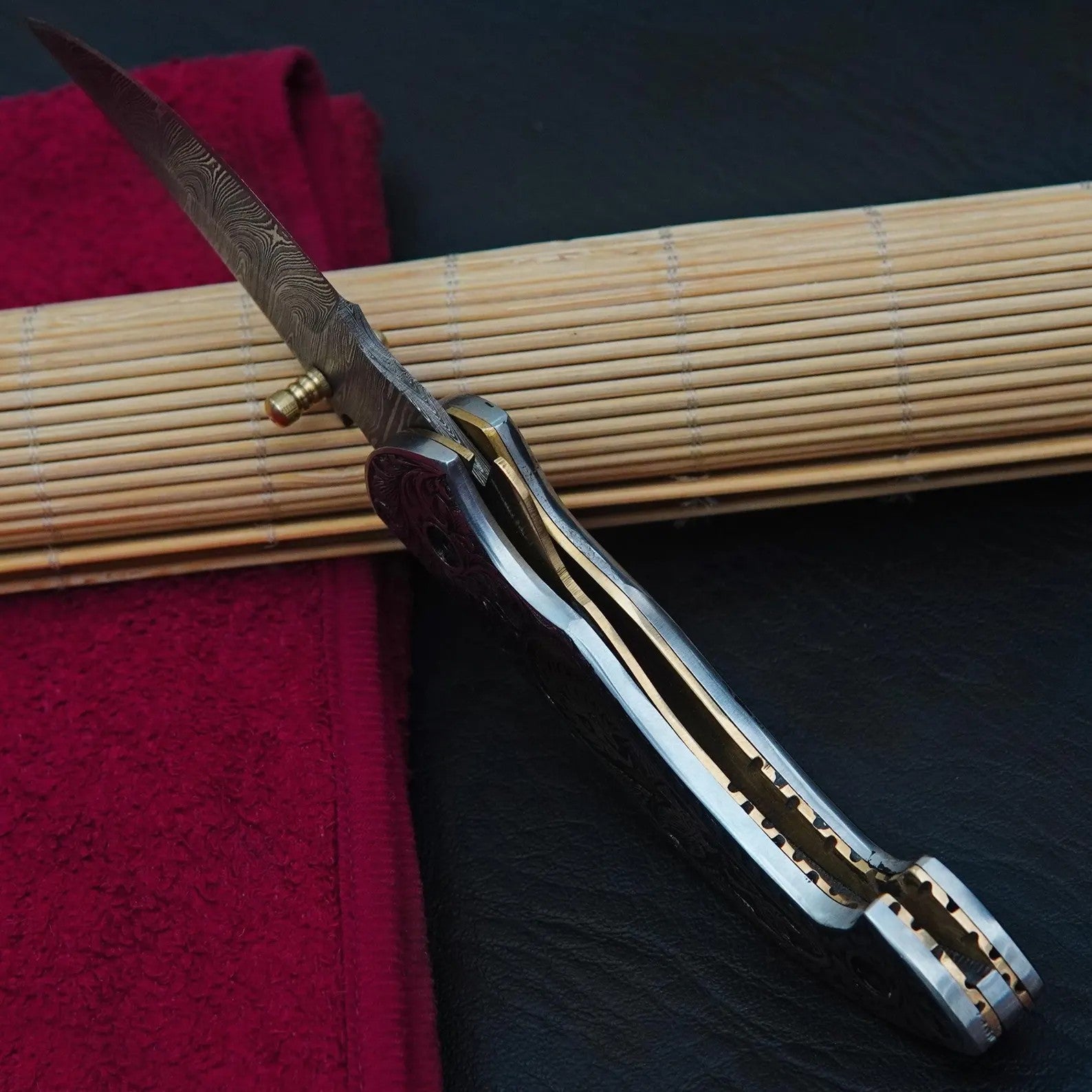 Nordic Forge Hand Engraved Damascus Folding Knife