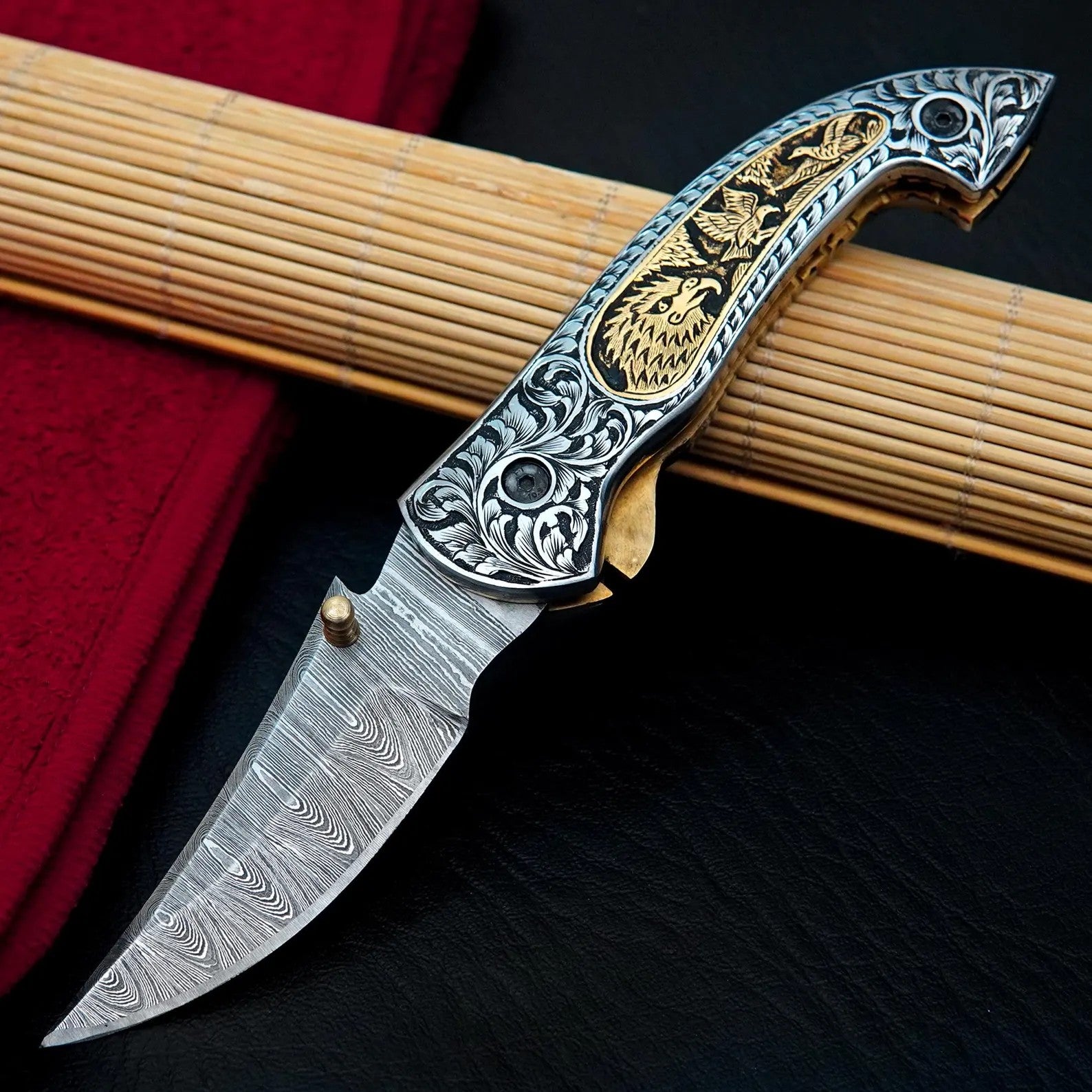 Nordic Forge Hand Engraved Damascus Folding Knife