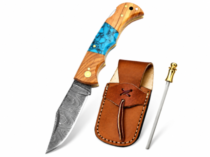 Turquoise-blue marbled inlay and brown wood-grain hunting knife handle with gold-colored pins and decorative trim