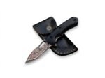 Black Handle Damascus-Style Compact Knife with silver-gray and copper-toned patterned blade, curved black handle and stitched black sheath