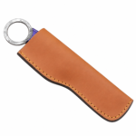 Purple handle ring-pommel knife inside a tan-brown stitched sheath with a decorative silver-gray circular metal ring visible.