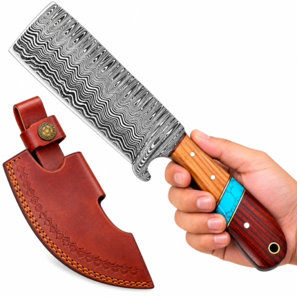 Damascus Steel Cleaver Knife with a broad patterned blade, two-tone wooden handle, turquoise-colored accent, and decorative brown leather-style sheath.