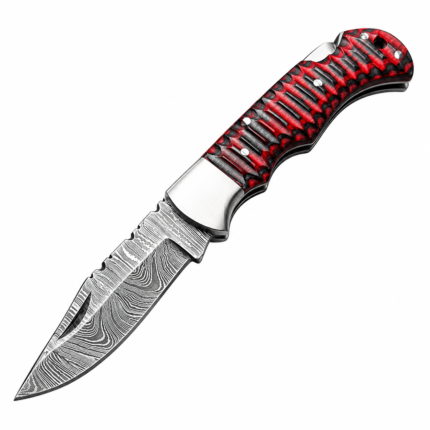 Open red and black folding knife with a deeply grooved handle, Damascus-style patterned blade, silver-tone bolster, and rear lanyard hole.