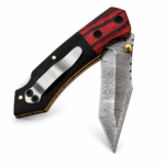 Damascus Steel Folding Pocket Knife with angular patterned blade, red and black handle, gold-colored pivot, and silver pocket clip.