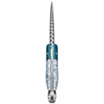 Turquoise Ring Handle Damascus Knife with curved silver-gray patterned blade, scalloped spine, turquoise and gray marbled grip, pictured beside a black stitched sheath.