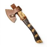 Leather Wrapped Viking Hatchet with golden-brown wood-grain handle, dark crisscross grip wrapping, geometric marking and brown stitched axe-head sheath