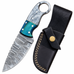 Turquoise Ring Handle Damascus Knife with curved silver-gray patterned blade, scalloped spine, turquoise and gray marbled grip, pictured beside a black stitched sheath.