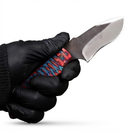 Red and Blue Handle Fixed Blade Skinning Knife with curved black and silver blade, turquoise patterned grip and orange stitched sheath