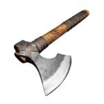Viking Bearded Axe featuring a curved steel-look blade, wooden handle with carved decorative motif and dark brown leather-style wrapping on white background.