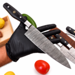 Damascus Pattern Chef Knife with flowing silver-grey blade pattern, black handle, silver bolster and decorative mosaic pin