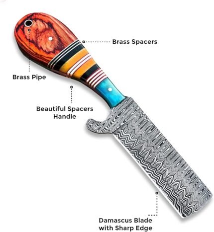 Close-up of Damascus Fixed Blade Knife showing decorative wave-patterned silver-grey blade