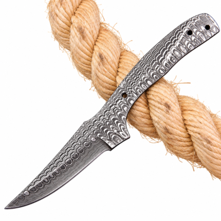 Damascus full tang knife blank with a silver-and-black wave-pattern blade, curved exposed metal handle and three holes, displayed diagonally over a tan rope.
