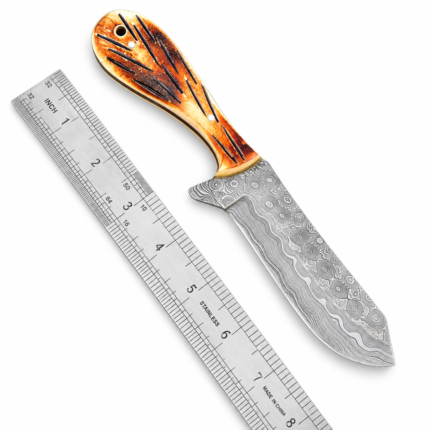 Compact Damascus-style skinning knife with curved patterned blade