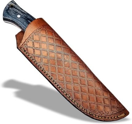 Black and gray handle knife with a plain silver blade, three silver-tone pins, and a rear opening, resting over a brown diamond-pattern sheath.