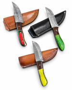 Damascus Hunting Knife Assortment showing four patterned fixed-blade knives with red, brown and black handles alongside decorative brown and black stitched sheaths.