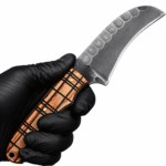 Curved blade hunting knife with dark gray steel blade, decorative cream-and-brown wood-grain handle, black geometric inlays, three brass-colored pins, and lanyard hole