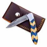 Blue Inlay Folding Pocket Knife shown open and folded with a Damascus-style patterned blade, blue-and-golden-brown geometric handle, and brown stitched pouch.