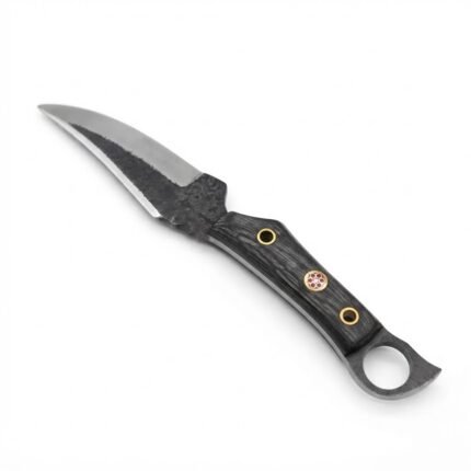 Black Ring Handle Skinner Knife with curved two-tone blade, black wood-grain-look grip, gold-tone mosaic-style pin and black stitched sheath