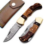 Brown Wood Handle Damascus Pattern Hunting Knife with a curved silver-gray patterned blade, gold-tone bolster, multitone wooden-look handle, and metallic pins