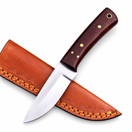 Fixed blade knife with a reddish-brown wood-grain handle, four gold-tone pins, and a lanyard hole beside a metal ruler.