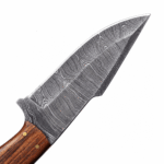 Premium Damascus hunting knife with a broad curved patterned blade, black and brown two-tone handle, blue mosaic pin, gold-tone fittings, and lanyard hole