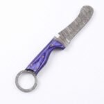 Full-length purple handle ring-pommel knife with curved Damascus-style blade, four gold-colored pins and patterned metal ring.