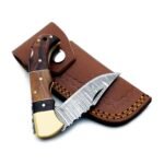 Brown Wood Handle Damascus Pattern Hunting Knife with a curved silver-gray patterned blade, gold-tone bolster, multitone wooden-look handle, and metallic pins
