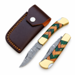 Open patterned folding knife with a green-and-tan geometric handle, gold-tone bolsters, three handle pins, and a curved blade