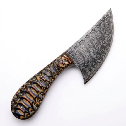 Patterned Handle Damascus Skinning Knife with broad curved gray blade, cream and black decorative handle and orange-brown stitched sheath