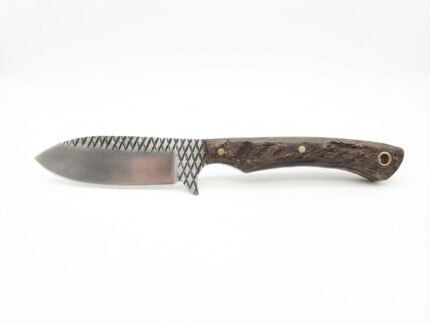 Decorative filework hunting knife with satin silver blade, dark crosshatched markings, brown wood-grain handle, brass-colored pins and rear lanyard hole.
