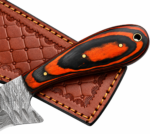 Orange Black Damascus Pattern Cleaver Knife with broad silver-gray blade, orange-and-black contoured handle and brown embossed stitched sheath.