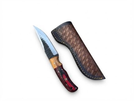 Red and Black Wood Handle Fixed Blade Hunting Knife with polished and dark two-tone blade beside a brown basketweave-style sheath