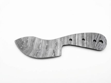 Wide belly knife blank with a flowing silver-gray pattern, broad curved blade, and exposed tang with three small holes and one larger rear opening.