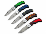 Five Damascus-Patterned Folding Pocket Knife variations featuring green, blue, black, orange, and red handles with decorative silver bolsters and patterned blades.