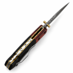 Damascus Steel Folding Pocket Knife with angular patterned blade, red and black handle, gold-colored pivot, and silver pocket clip.