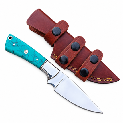 Turquoise Handle Fixed Blade Knife with a polished silver pointed blade, blue veined handle, decorative circular inlay and silver-colored bolster