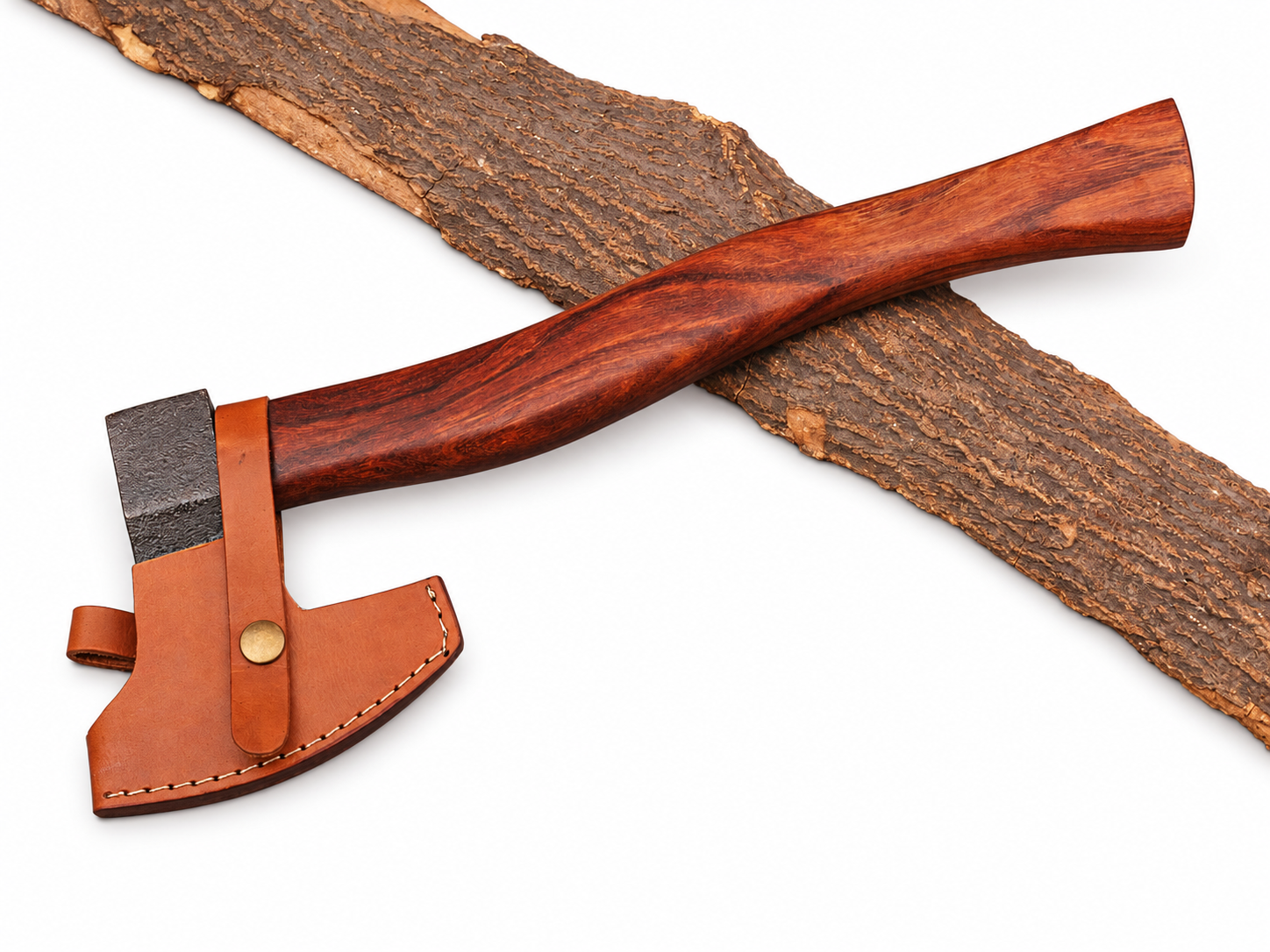 faf6f031-e2ea-4140-a879-1e88e6fb2626 Curved handle hatchet with brown wood-grain handle, dark textured metallic head, bright silver-colored blade edge and tan stitched sheath displayed over natural bark.