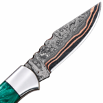 Green Resin Handle Damascus Hunting Knife with copper-accented patterned blade, dark wood-grain grip, silver bolster and brown stitched sheath with metal rod.