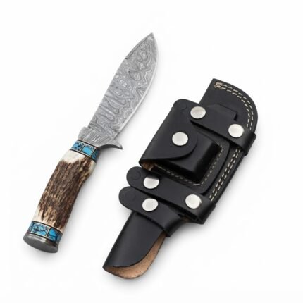Antler-look fixed blade knife with a patterned blade and turquoise-colored handle bands beside a black sheath with a front pouch.