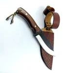 Wood Handle Hunting Knife with curved black and silver blade, brown wood-grain handle, two metal pins and olive-green cord lanyard