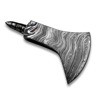 Damascus Pattern Bearded Axe Head with black-and-silver flowing metal patterns, a broad curved blade, small circular decorative accent and short tapered rear projection.