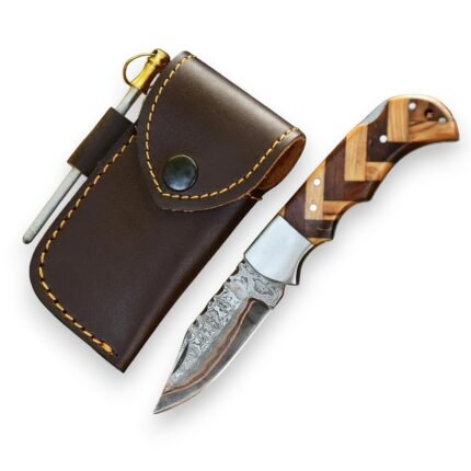 Chevron wood handle Damascus knife with a copper-accented patterned blade, silver bolster, dark brown stitched pouch and attached metal rod