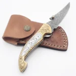 Engraved Damascus Folding Knife with Curved Patterned Steel Blade, Ornate Gold and Silver Floral Handle and Brown Leather Pouch
