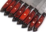 Dark reddish-brown wooden-look chef knife handle with natural grain markings and two silver-colored decorative spacers