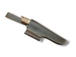 Rustic fixed blade knife with a dark textured blade, brown grain-pattern handle, two silver-tone pins, and bright bolster over a brown stitched sheath.