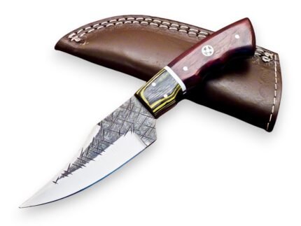 Etched Hunting Knife with curved silver blade, dark crosshatched markings, black-and-yellow and reddish-brown handle, shown over a brown stitched sheath.