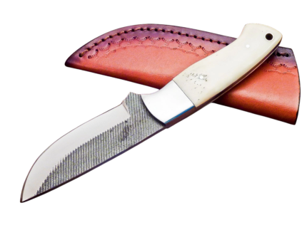 White handle rasp finish hunting knife with textured silver blade, polished bolster, cream grip and brown decorative stitched sheath