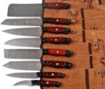 Damascus Chef Knife with silver-grey patterned blade, dark brown wood-grain handle and decorative silver spacer lines on white background